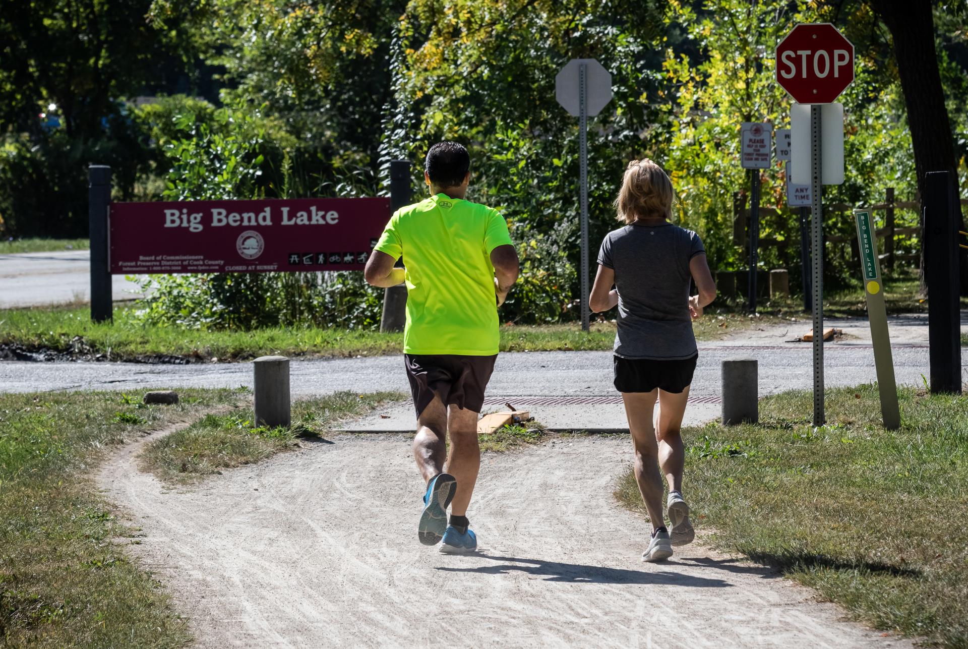 Joggers in Forest Preserve